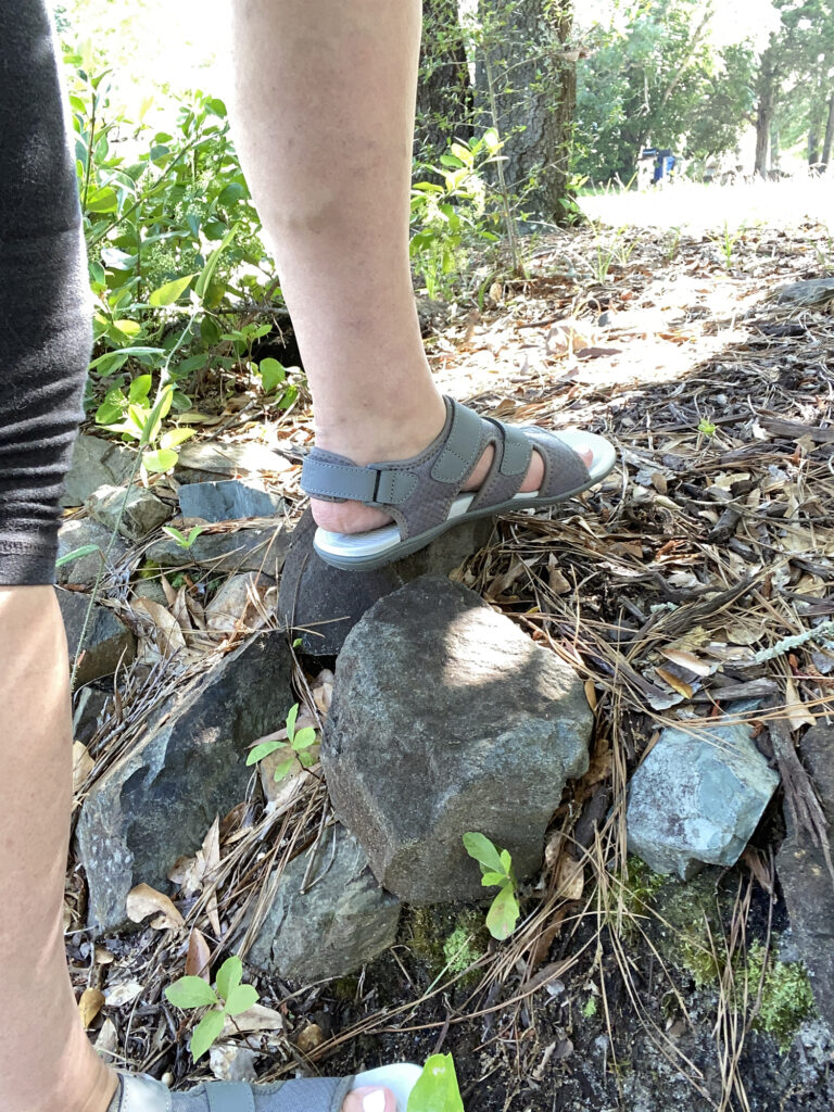Chris modeling footwear in the outdoors for a UGC image
